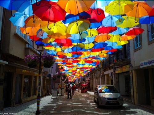 A street in Portugal with a umbrella canopy