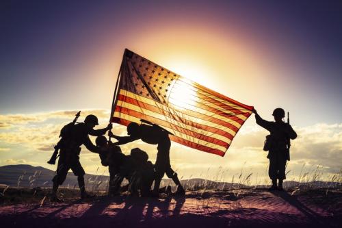 Soldiers and flag