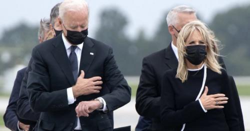 Biden Looking at Watch During Service Members Who Died (Arrived Home)