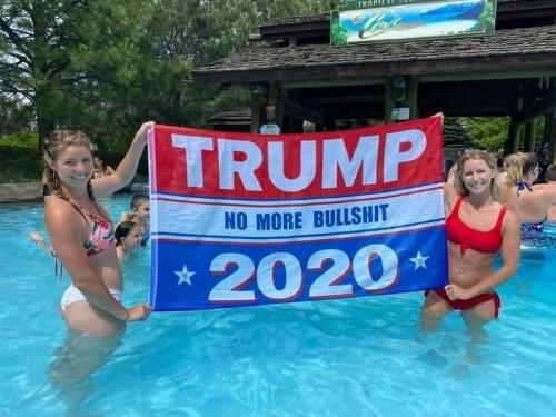 2 girls Trump banner