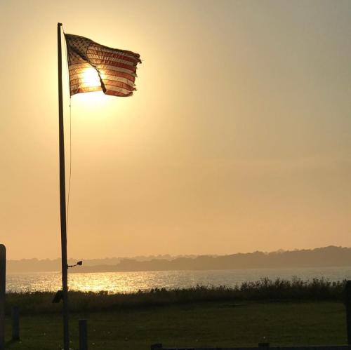 Flag - With sun setting behind