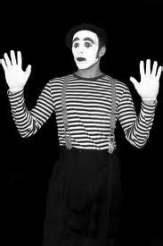 Mime hands up