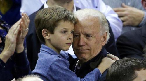 bidenholdingboy