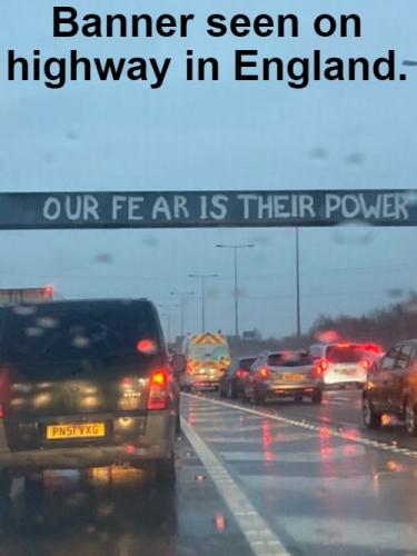 Banner seen on highway in England our fear is their power