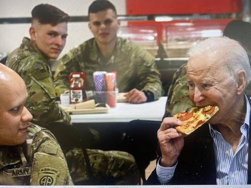 Biden eating with disgusted soldiers