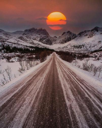 Sunset - On mountain road in snow