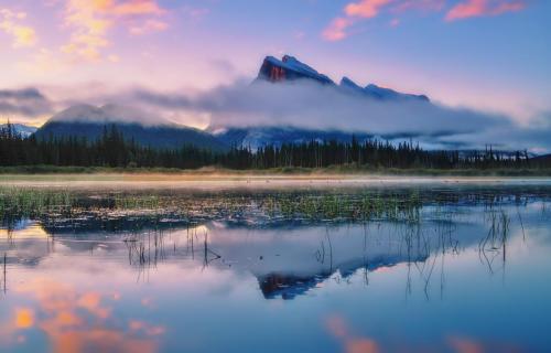 Sunrise reflections at Vermilion Lakes in Banff National Park. Banff, AB, Canada