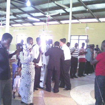 Beard praying for Ghana ministers