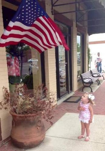 Flag - Girl saluting flag