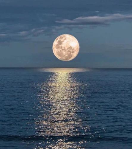 Moon - Full over ocean