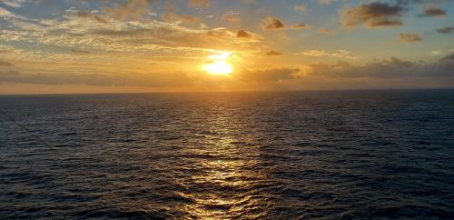 Good Night 52 - Sun setting over ocean