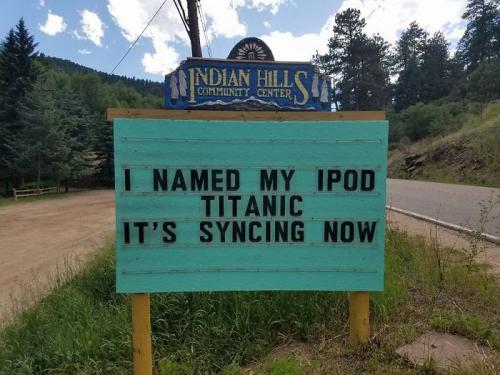 Signs, Indian Hills Community Center -- 'IPOD Titanic Sinking'.