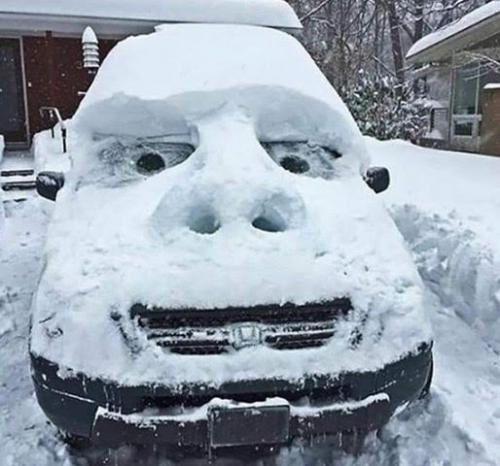 Car, Snow, Ice -- Snowmobile