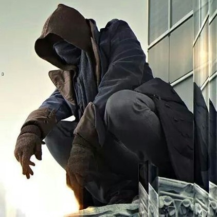 = HOODED SOULDIER ON BUILDING