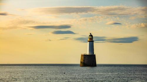 Rattary head lighthouse on the coast of aberdeenshire. Rattray, Peterhead, UK