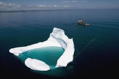 Iceberg, Newfoundland -- Harvest Towing an Iceberg