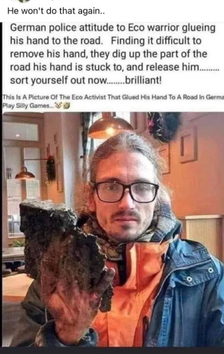 eco warrior with road on his hand