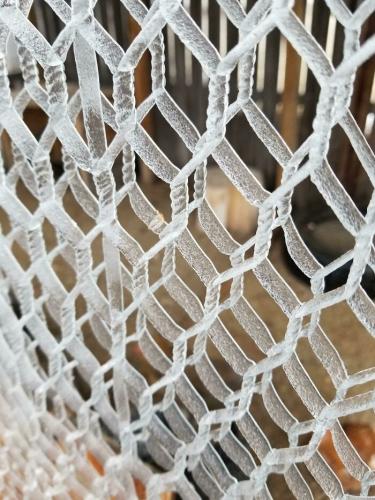 Ice-Snow Geometry - Freezing Drizzle clings to Chicken Wire