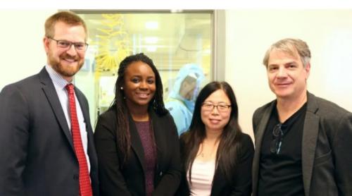 Dr.-Xiangguo-Qiu-with-her-team-at-Canadas-National-Microbiology-Laboratory-696x388