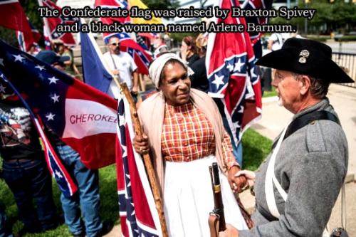 The Confederate flag was raised by Braxton Spivey