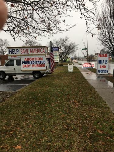 Richard Justman -- Signs 'Help Save America, Abortion Premediated Baby Murder' (Left side, Street View) {Nov Election 2022}1