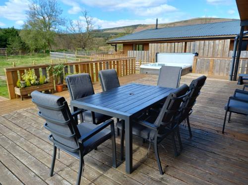 outside-seating-on-decking-with-view-of-the-mountains