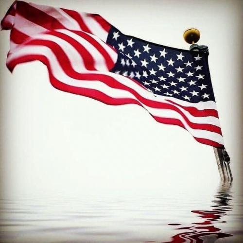 Flag - On pole coming out of water