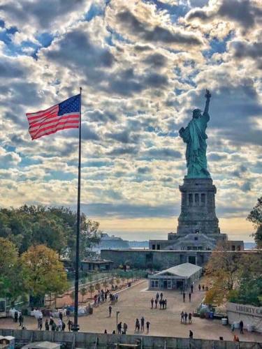 Flag - Behind the Statue of Liberty
