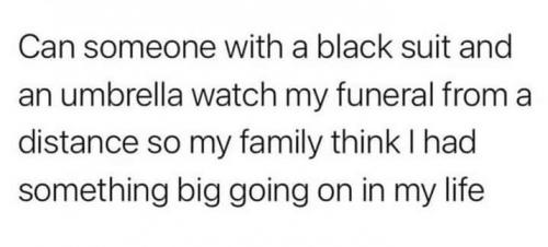 Funeral - Black suit and umbrella