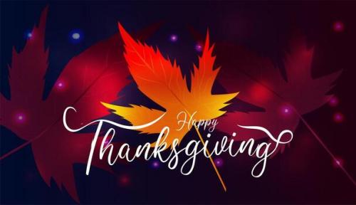 happy-thanksgiving-with-maple-leaves-and-dark-bokeh
