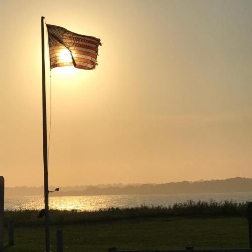 Flag - With sun setting behind