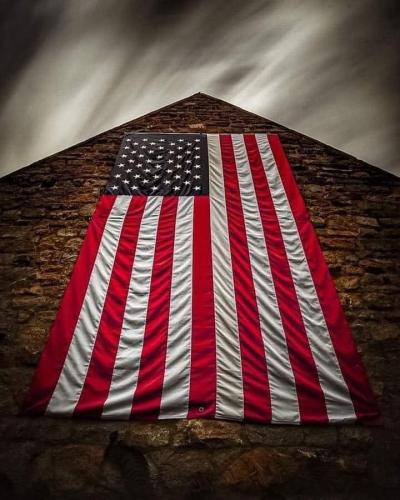 Flag - On rock faced wall